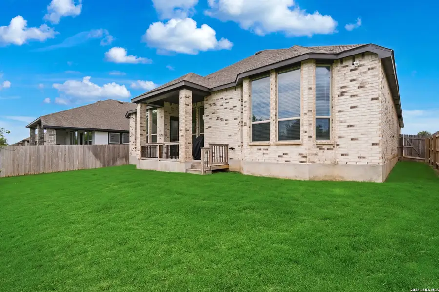 Exterior details and patio area of a home in Davis Ranch, San Antonio (Image 24).