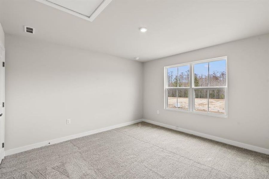 Spacious, unfurnished interior of a new home in Lakes at Riverbend, Navassa (Image 13).