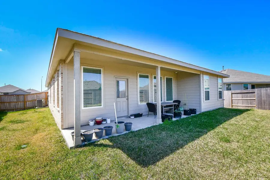 Exterior details and patio area of a home in Anniston, Katy (Image 3). Exterior details and patio area of a home in Anniston, Katy (Image 3).