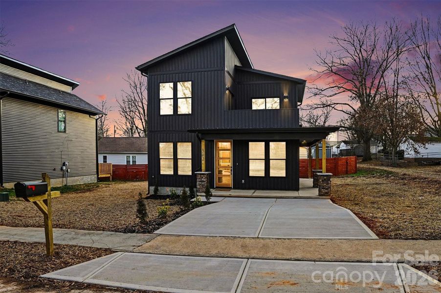 Front exterior of a new home in , Kannapolis, NC, highlighting curb appeal (Image 13).