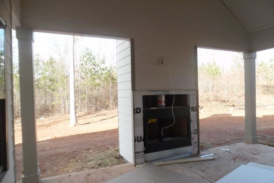 Exterior details and patio area of a home in Highgate, Newnan (Image 2). Exterior details and patio area of a home in Highgate, Newnan (Image 2).