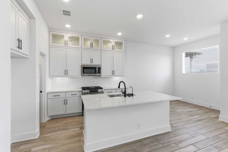 Furnished interior view inside a new home in Centero at Stone Oak, San Antonio (Image 8).
