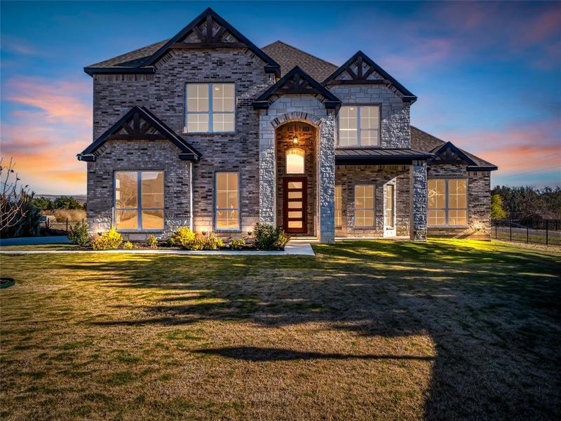 Front exterior of a new home in , Ennis, TX, highlighting curb appeal (Image 1). Front exterior of a new home in , Ennis, TX, highlighting curb appeal (Image 1).
