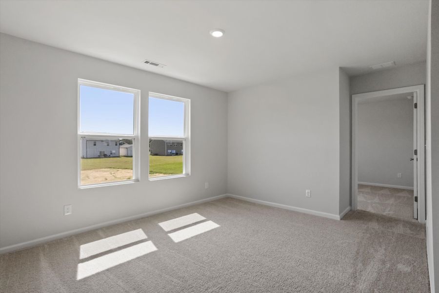 Spacious, unfurnished interior of a new home in Cambridge Reserve, Angier (Image 23).