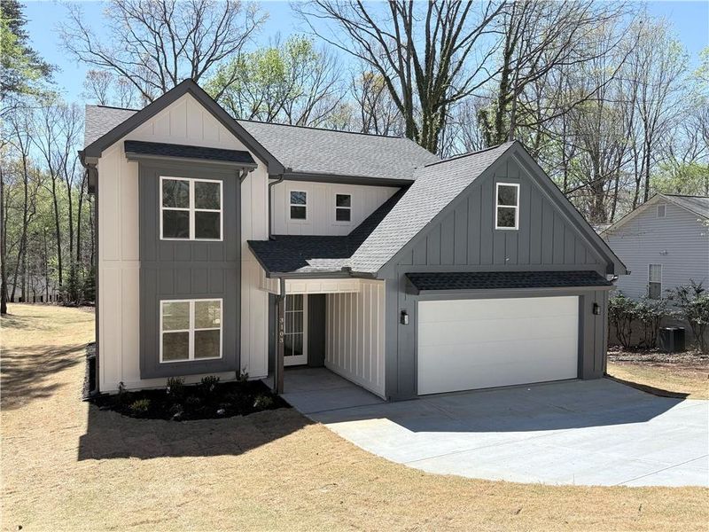 Front exterior of a new home in , Gainesville, GA, highlighting curb appeal (Image 1). Front exterior of a new home in , Gainesville, GA, highlighting curb appeal (Image 1).