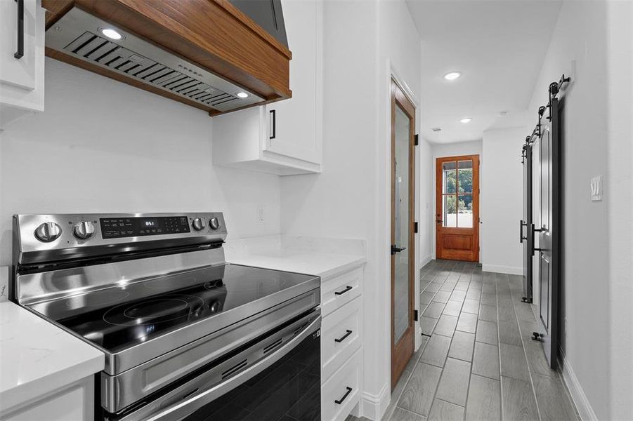 Open kitchen and living room with fireplace