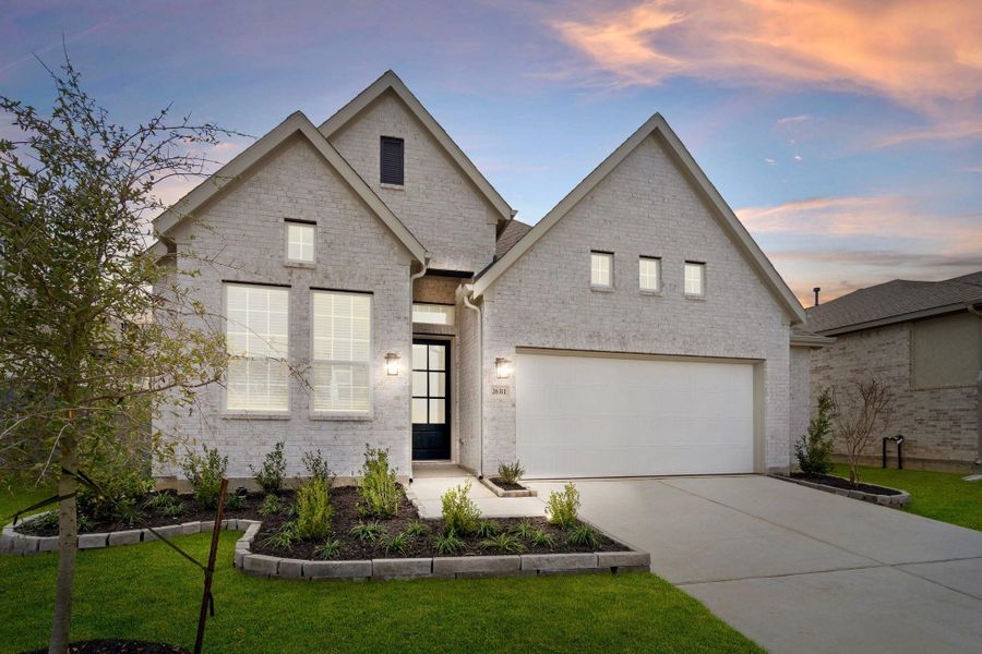 Front exterior of a new home in The Woodlands Hills, Willis, TX, highlighting curb appeal (Image 19).