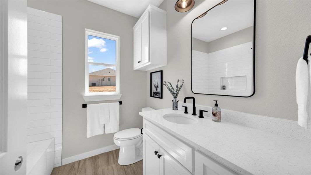 Furnished interior view inside a new home in Parallel Pastures, Poolville (Image 18).