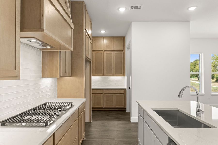 Furnished interior view inside a new home in Lily Creek at Sutton Fields, Aubrey (Image 10).