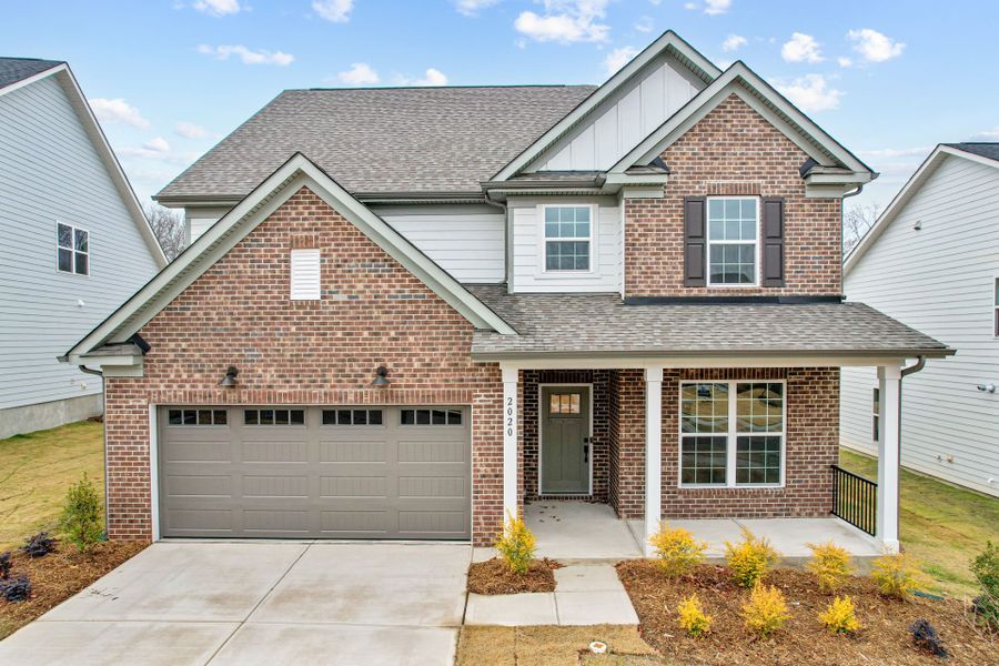 Front exterior of a new home in Forest Creek, Waxhaw, NC, highlighting curb appeal (Image 35).