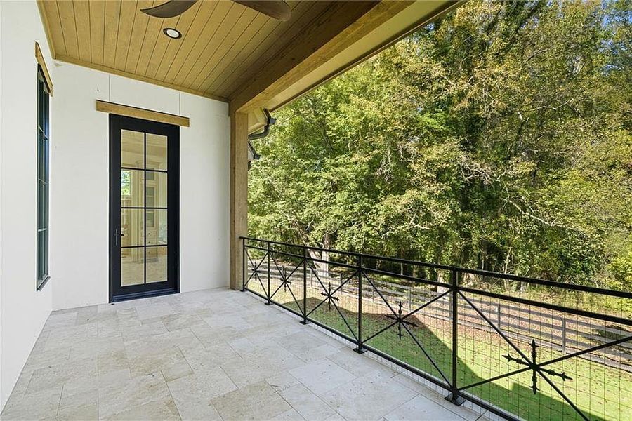 Exterior details and patio area of a home in Crossroads, Alpharetta (Image 4).