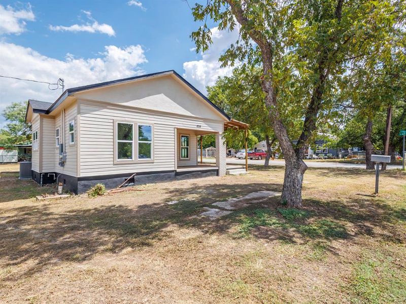 Front exterior of a new home in , Coleman, TX, highlighting curb appeal (Image 2). Front exterior of a new home in , Coleman, TX, highlighting curb appeal (Image 2).