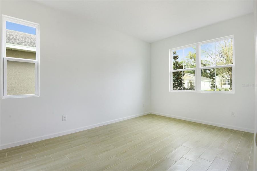 Spacious, unfurnished interior of a new home in Seasons at Grandview Gardens, Deland (Image 17). Spacious, unfurnished interior of a new home in Seasons at Grandview Gardens, Deland (Image 17).