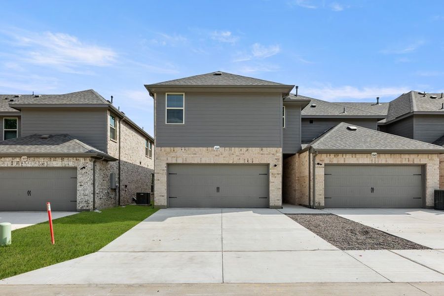 Representative exterior photo of a completed home built from the Texoma by Impression Homes in Timber Ridge, Corinth, TX (Image 24). Representative exterior photo of a completed home built from the Texoma by Impression Homes in Timber Ridge, Corinth, TX (Image 24).