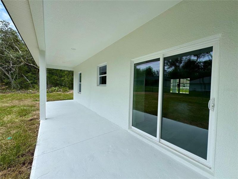 Exterior details and patio area of a home in , Citrus Springs (Image 17).