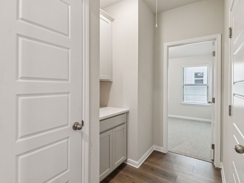 Hallway in the Callaghan floorplan at a Meritage Homes community.