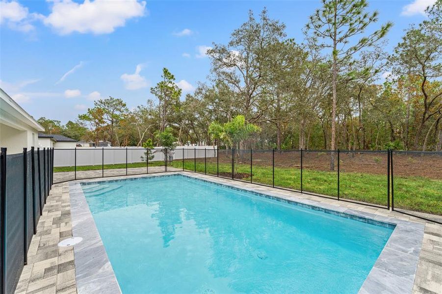 Exterior details and patio area of a home in , Brooksville (Image 41). Exterior details and patio area of a home in , Brooksville (Image 41).