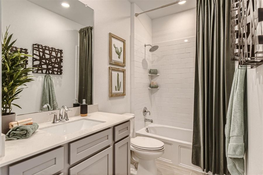 Furnished interior view inside a new home in Bridgeland, Cypress (Image 5).