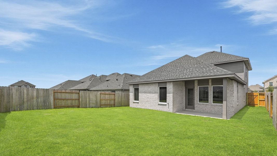 Exterior details and patio area of a home in Cypress Green, Tomball (Image 4).