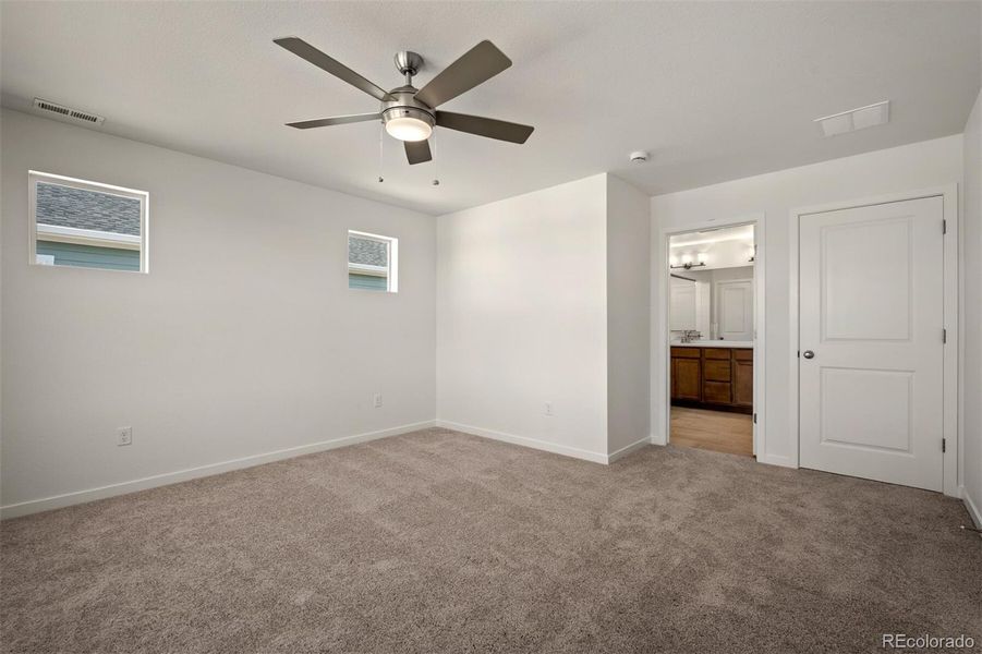 Spacious, unfurnished interior of a new home in Revel Crossing at Wolf Ranch – The Ascent Collection, Colorado Springs (Image 23).