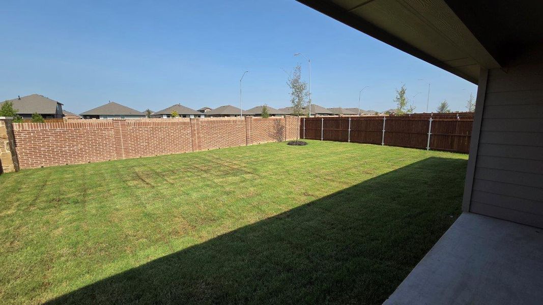 Exterior details and patio area of a home in Lonestar at Liberty Trails, Fort Worth (Image 2).