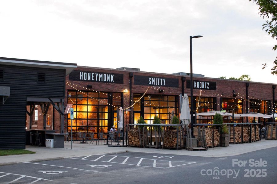 Front exterior of a new home in , Charlotte, NC, highlighting curb appeal (Image 24).