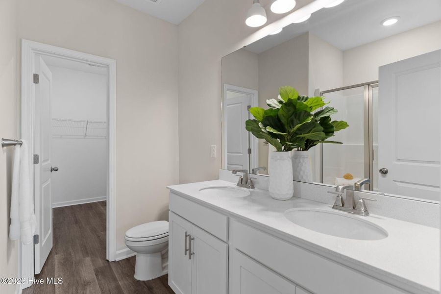 Furnished interior view inside a new home in Coastal Haven Townes, Leland (Image 12).
