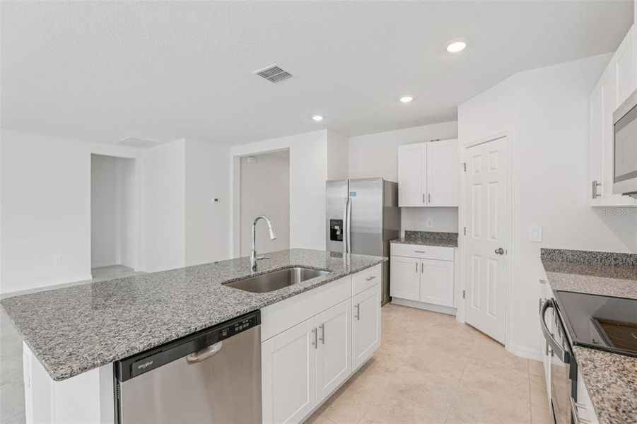 Furnished interior view inside a new home in Deer Run at Crosswinds, Davenport (Image 17).