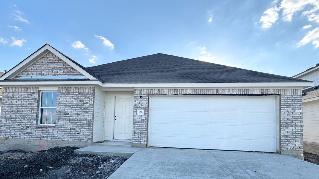 Front exterior of a new home in Sky Ridge, San Marcos, TX, highlighting curb appeal (Image 2). Front exterior of a new home in Sky Ridge, San Marcos, TX, highlighting curb appeal (Image 2).