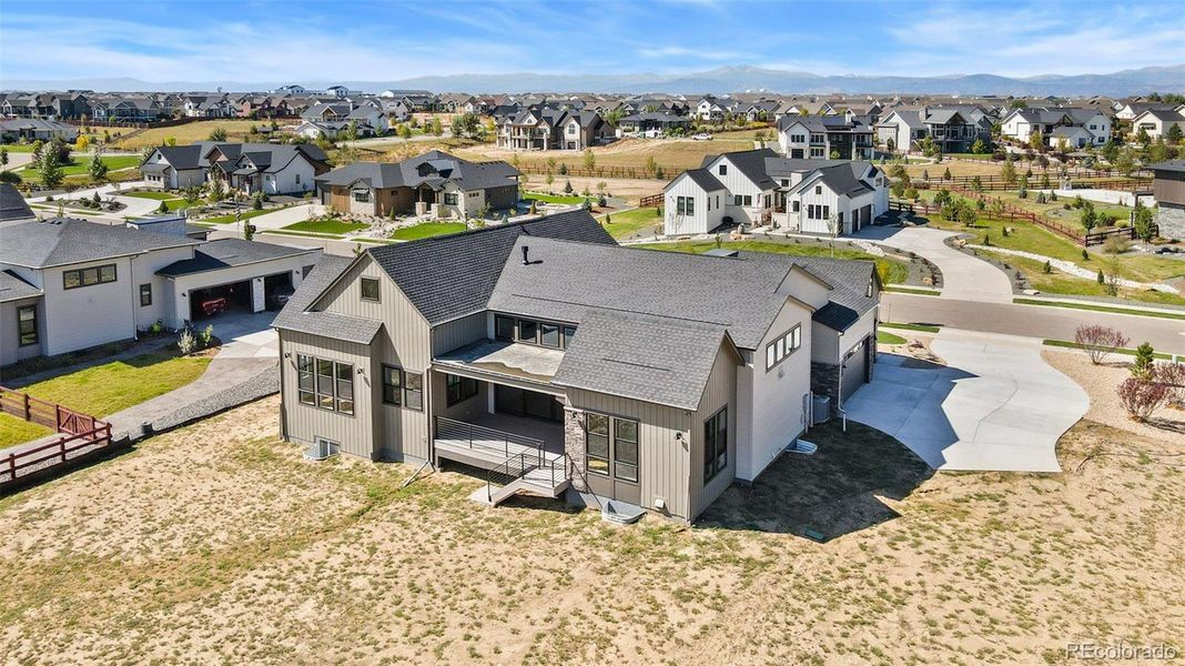 Front exterior of a new home in Acadia at RainDance, Windsor, CO, highlighting curb appeal (Image 15).
