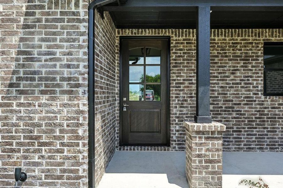 Front exterior of a new home in , Sanger, TX, highlighting curb appeal (Image 18). Front exterior of a new home in , Sanger, TX, highlighting curb appeal (Image 18).