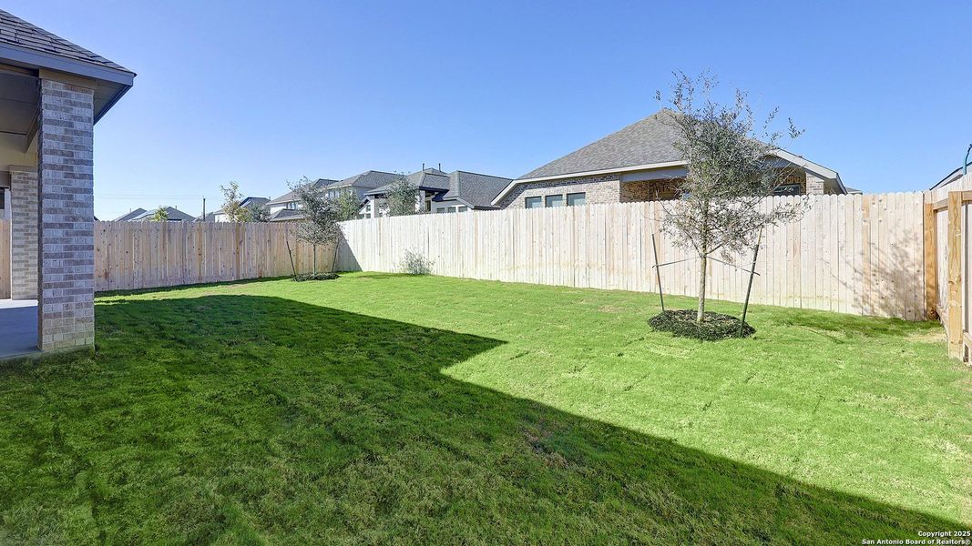 Exterior details and patio area of a home in Kallison Ranch 50', San Antonio (Image 27).