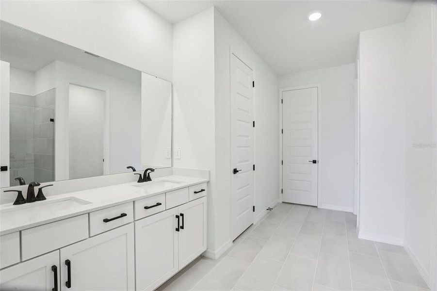 Furnished interior view inside a new home in Two Rivers - Signature Series, Zephyrhills (Image 17). Furnished interior view inside a new home in Two Rivers - Signature Series, Zephyrhills (Image 17).