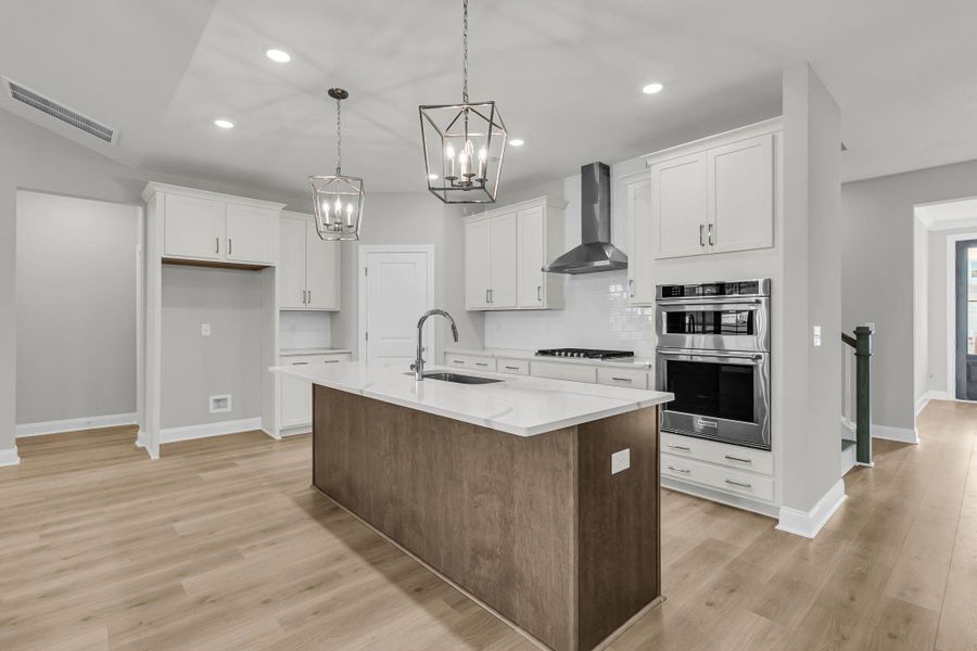 Furnished interior view inside a new home in Tidewater at Lakes of Cane Bay, Summerville (Image 9).