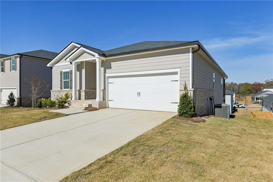 Front exterior of a new home in Preserve at Mountain Creek, Pendergrass, GA, highlighting curb appeal (Image 25).