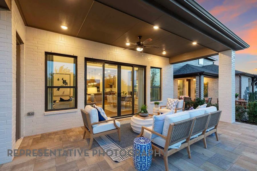 View of patio / terrace featuring outdoor lounge area and ceiling fan View of patio / terrace featuring outdoor lounge area and ceiling fan