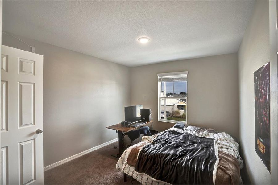 Furnished interior view inside a new home in Hammock Reserve, Haines City (Image 10).