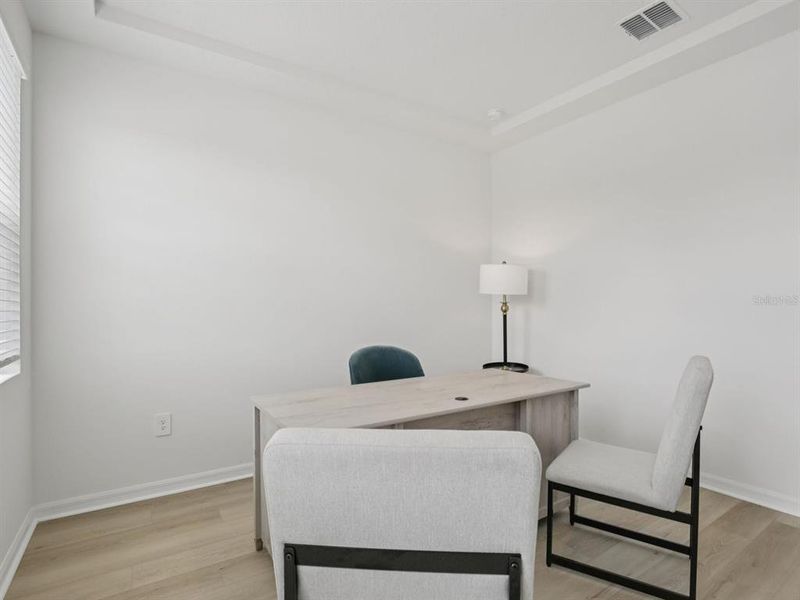 Furnished interior view inside a new home in Coasterra - Reserve Series, Palmetto (Image 10).
