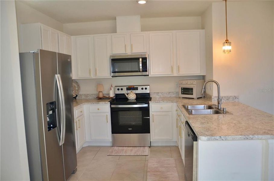 Furnished interior view inside a new home in , Davenport (Image 7).