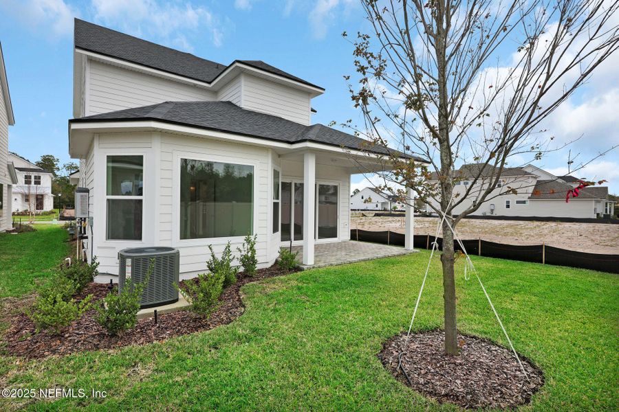 Exterior details and patio area of a home in Seabrook Village at Seabrook, Ponte Vedra (Image 4).