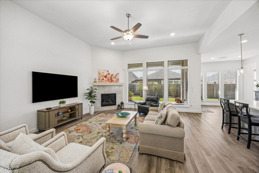 Open concept living space just off of dining room and kitchen