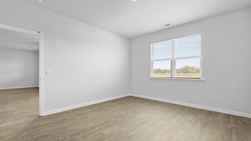 Representative unfurnished interior of a home built from the ARIA by D.R. Horton in The Ranch, Holly Hill (Image 23).