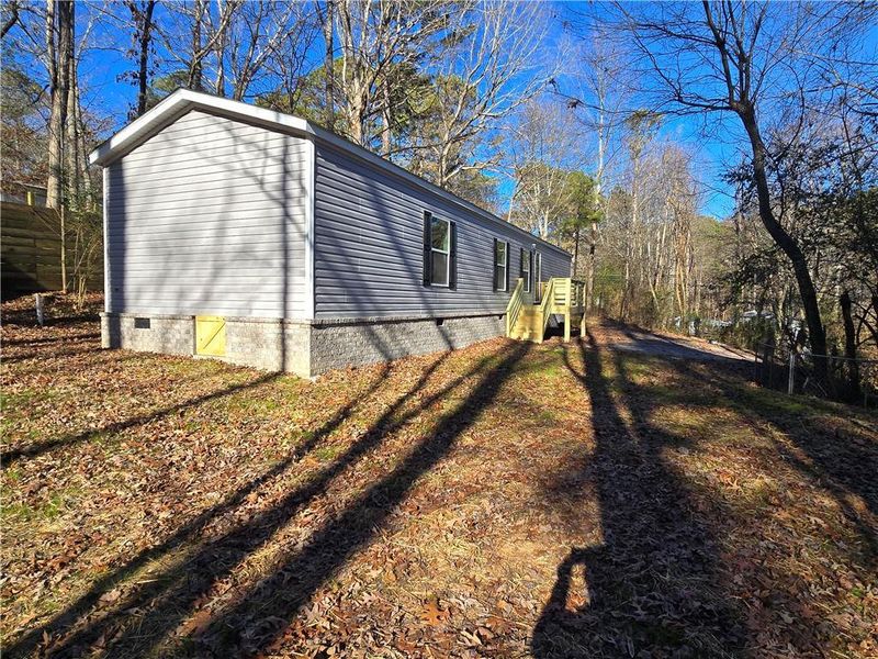 Exterior details and patio area of a home in , Talking Rock (Image 2). Exterior details and patio area of a home in , Talking Rock (Image 2).