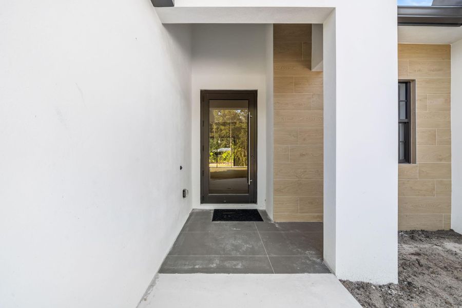 Exterior details and patio area of a home in , Loxahatchee (Image 2).