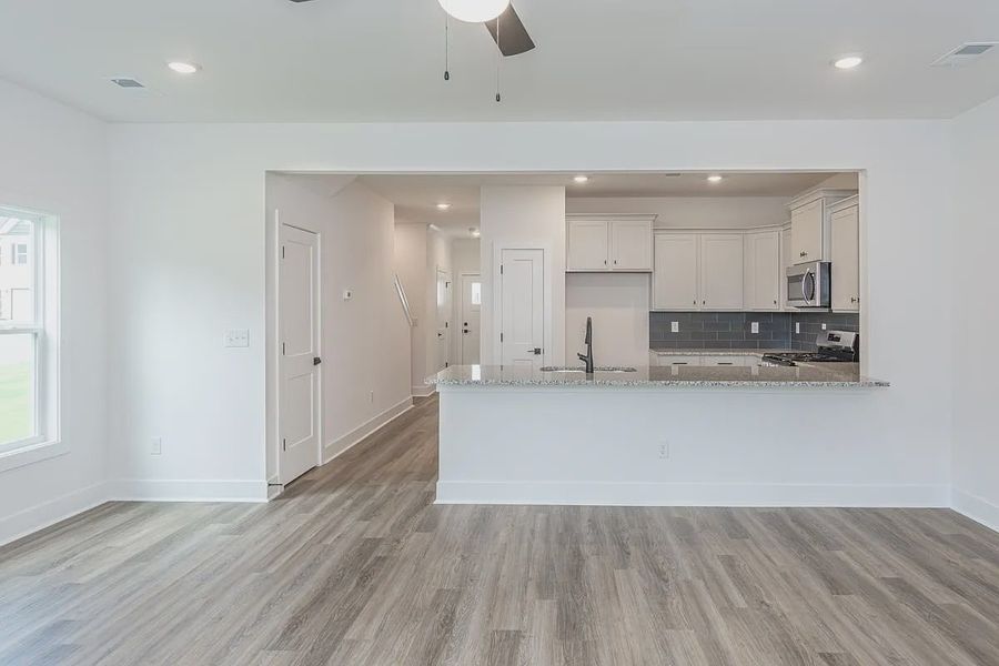 Representative unfurnished interior of a home built from the 1808 Townhome by Adams Homes in Parkstone Place Townhomes, Roebuck (Image 9). Representative unfurnished interior of a home built from the 1808 Townhome by Adams Homes in Parkstone Place Townhomes, Roebuck (Image 9).