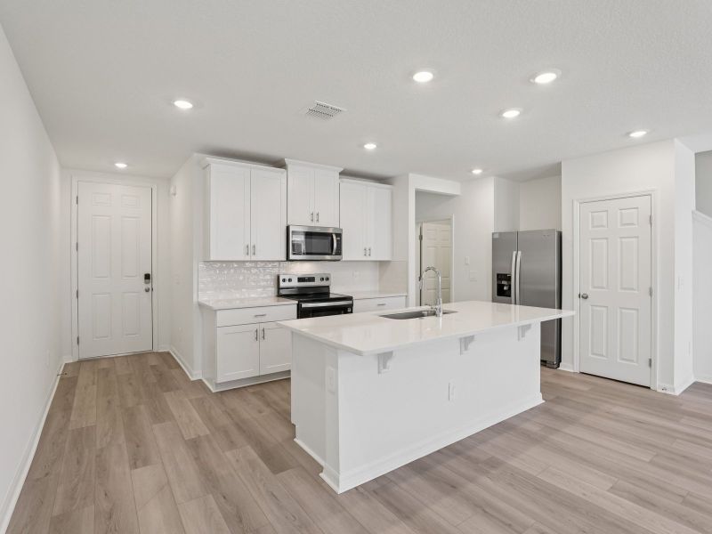 Furnished interior view inside a new home in The Meadow at Crossprairie Townes, St. Cloud (Image 3). Furnished interior view inside a new home in The Meadow at Crossprairie Townes, St. Cloud (Image 3).