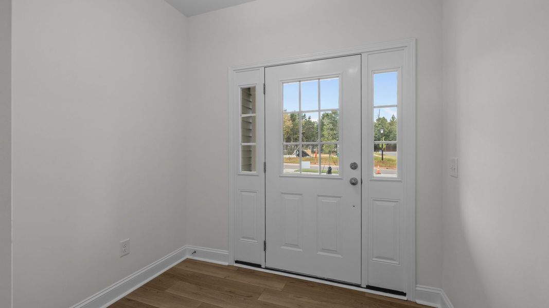Furnished interior view inside a new home in Leigh Park, Charlotte (Image 2).