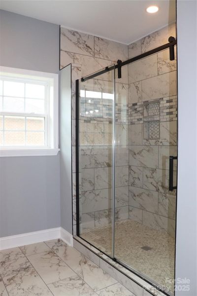 Furnished interior view inside a new home in , Lenoir (Image 8).