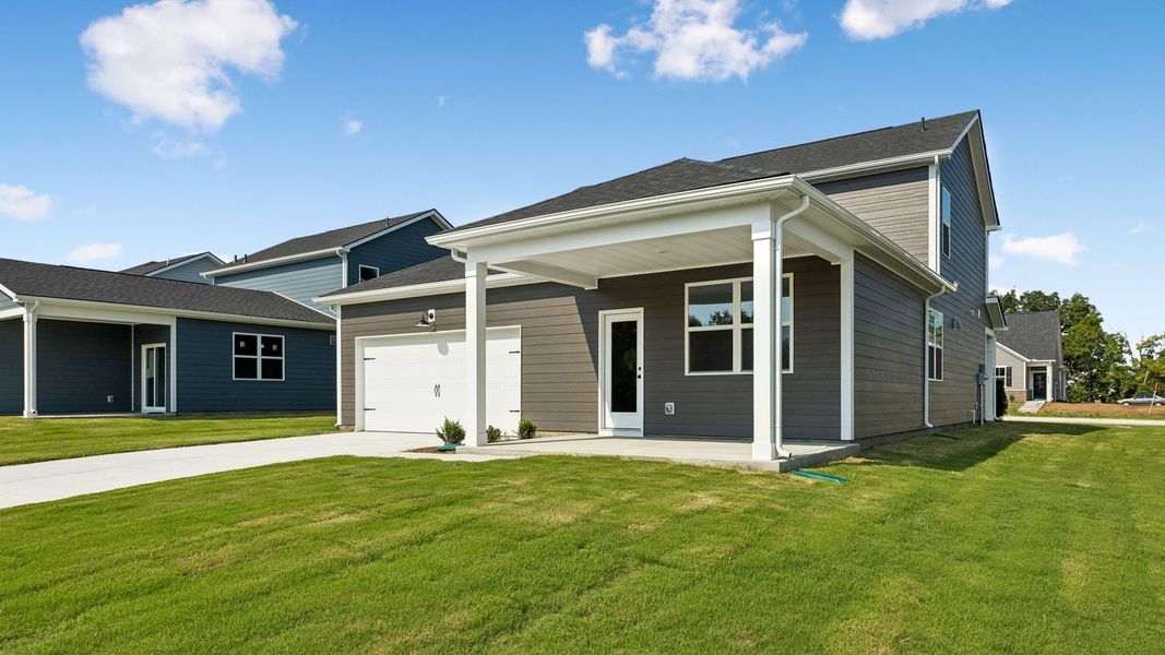 Front exterior of a new home in Reserve at Hickory Ridge, Columbia, TN, highlighting curb appeal (Image 26). Front exterior of a new home in Reserve at Hickory Ridge, Columbia, TN, highlighting curb appeal (Image 26).