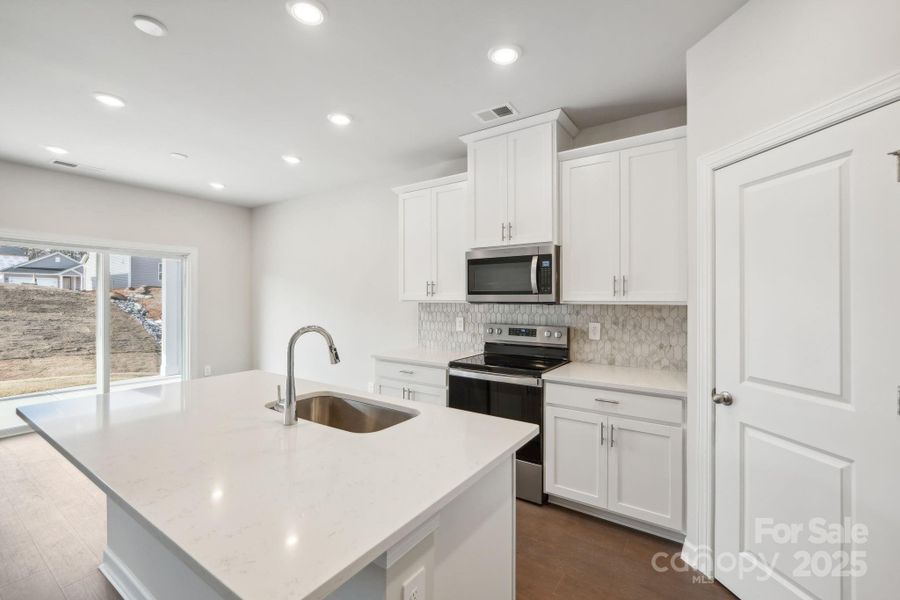 Furnished interior view inside a new home in Harper Landing, Stanley (Image 14).